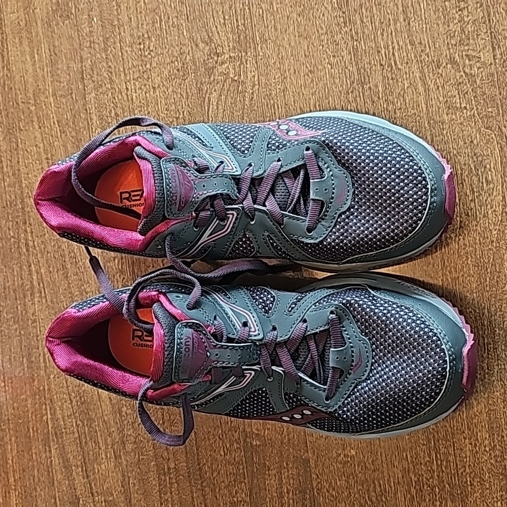 This is a pair of like new grey saucony running shoes in a size 8.5